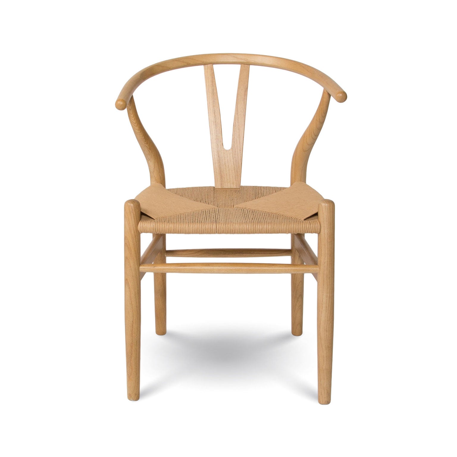 Front view of wishbone dining chair in light wood finish with natural rattan seat.